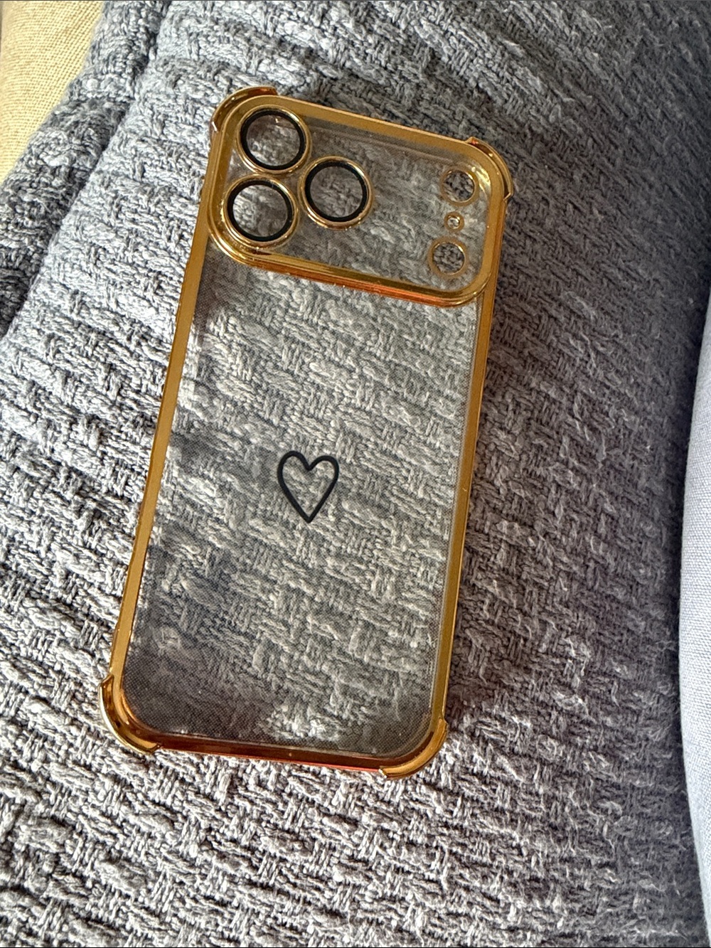 Clear Phone Case with Gold Trim and Heart Accent for iPhone 17 pro max
